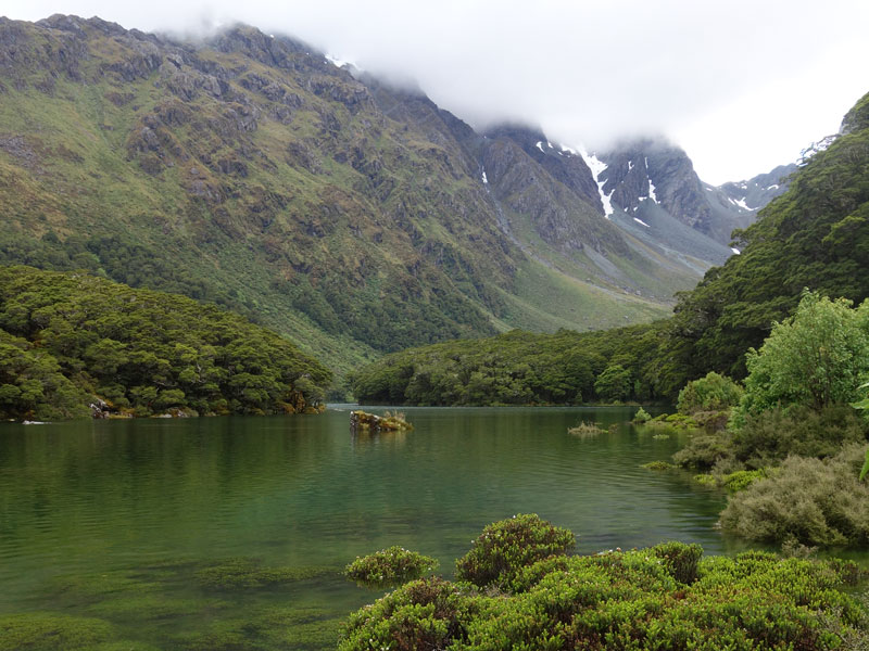 Lake with mountains behind